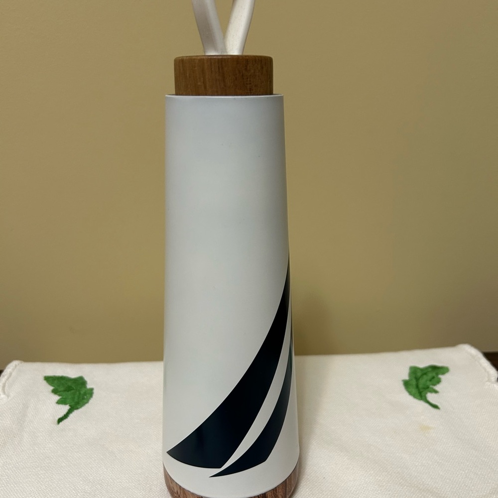Nautica navy and white metal water bottle.